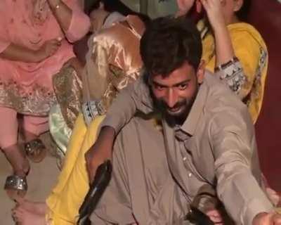 Dude blows a hole in his hand after playing with a live firearm.