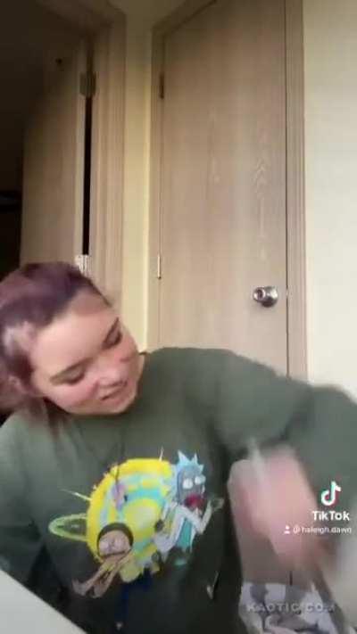 Doing a TikTok video with a sharp knife.