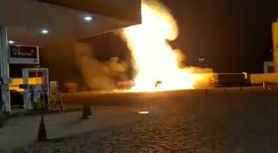 A long but closed up view of the explosion at the gas station in Brazil