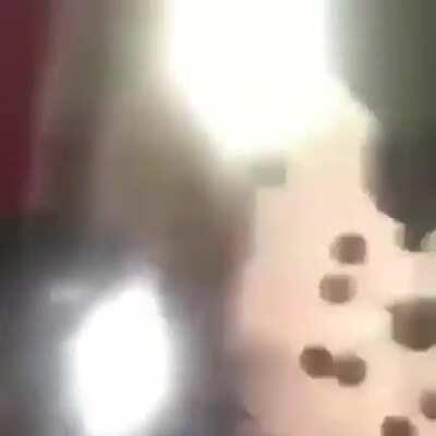 Man disrupts a funeral then smacks the dead body.