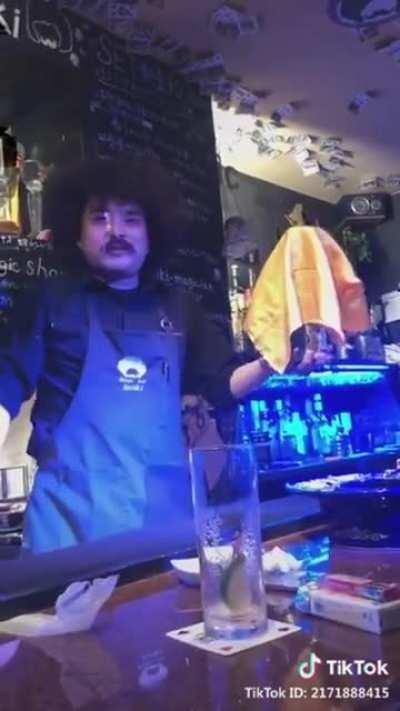 A wizard behind a bar