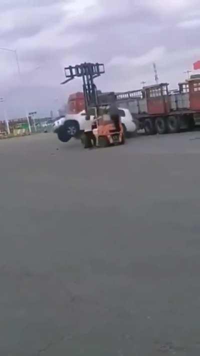 WCGW Unloading a SUV with small fork lift
