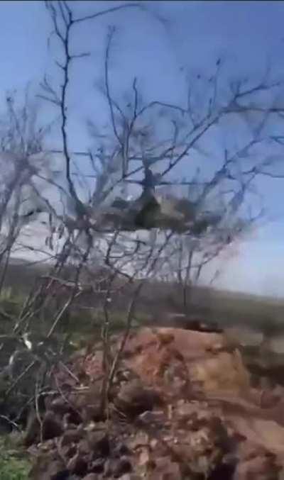 RU POV: Russian soldier records himself between a KA-52 and a MI-28 flying extremely low. Original audio