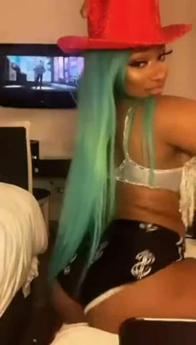 Megan Thee Stallion riding an imaginary cock