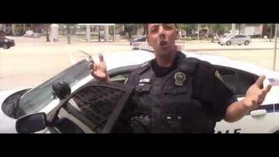 Cop threatens to arrest someone but backs down when called out on his BS