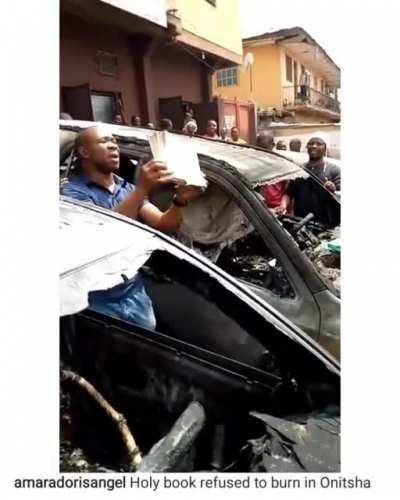 Mixed reactions as Bible remains intact while fire destroys car and everything else inside it