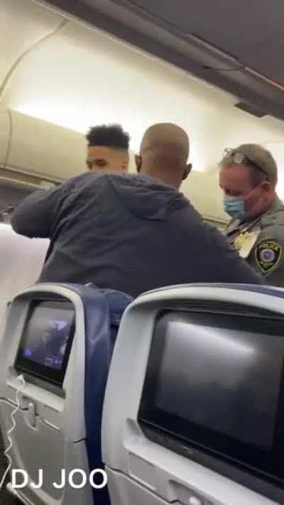 Antimask dumbfuck assaults flight attendant and air marshal. Then he gets escorted off the plane by cops.