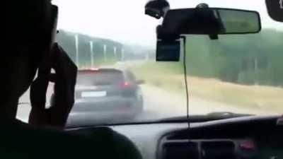 Guy driving like an idiot,tailgates a man who is driving with his wife and child. The idiot then passes and brake checks the family and corners them in with no escape leaving the dad no option but to protect his family. Idiot driver gets a lesson in 