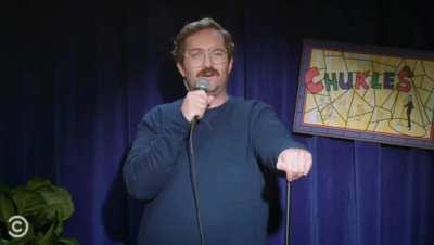 Sam's joke on Trevor's Comedy Central show. Sam's mustache proves that this is not a joke.