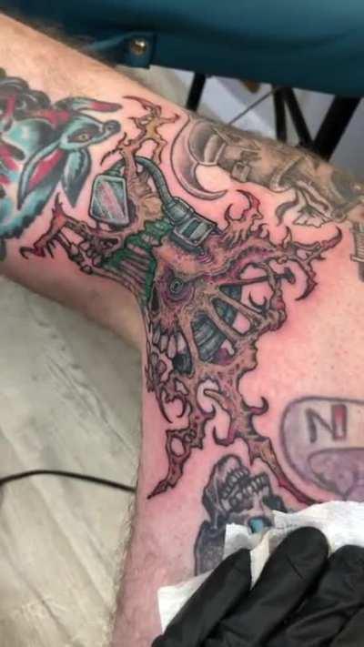 My most recent tattoo, poor guy gets his head ripped in half as my knee moves