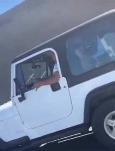 Racist Road Rager Gets Instant Karma 