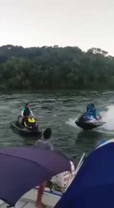 Throwing a glass bottle at a jetski