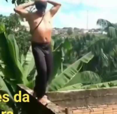 Blindfolded Chucking on some unfinished building.