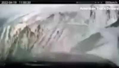 Truck Driver’s dash cam captures the moment they slid off a snowy road and off the edge of a mountain…