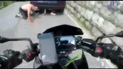 Trying to pass a car by sliding under it