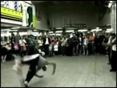 Child gets kicked by breakdancer and flies