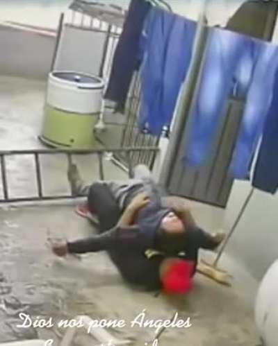 This guy catching his colleague after the ladder slipped.