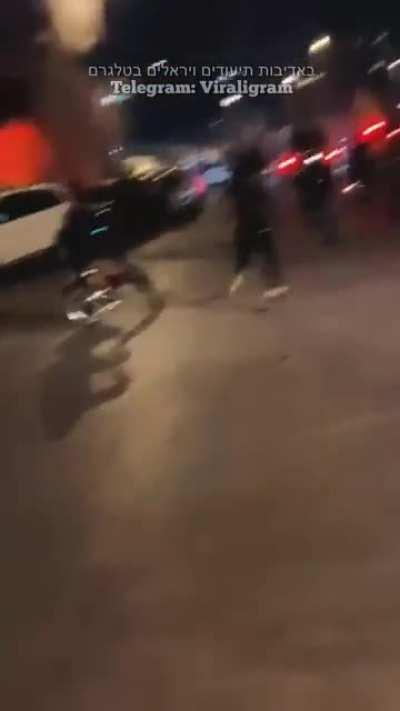 Trying to set fire to a store while you stand in front of it