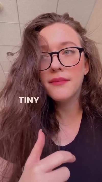 Kat in black tee and glasses - IG September 2025