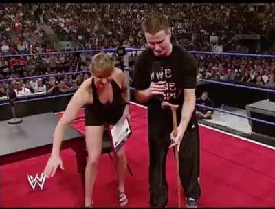 Stephanie giving Zach gowen his contract
