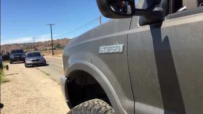 Photographer nearly ran over by angry driver