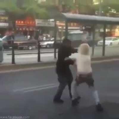 Crazy street fight which includes a man with two stumps for arms