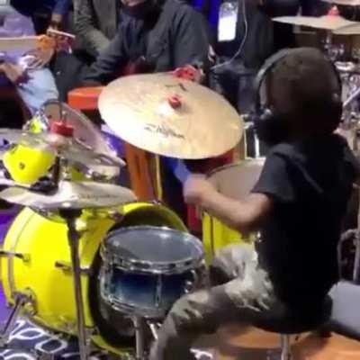 This band stopped the song just to let this young drummer have his solo