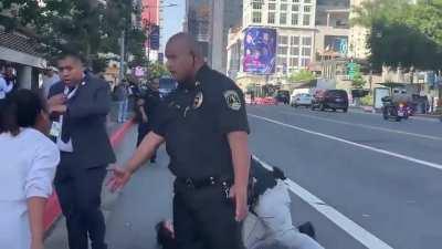 [Insane] In Los Angeles, leftist/Democrat pro-abortion activist attempts to block Democrat president Biden's motorcade. She is quickly tackled by Secret Service.