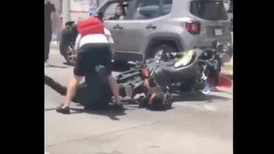 Civilian beating a motorcycle cop