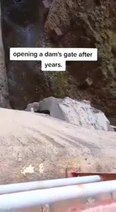 Opening an abandoned dam's gate