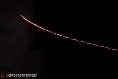 C-RAM (Counter Rocket, Artillery, and Mortar) defending against a night attack