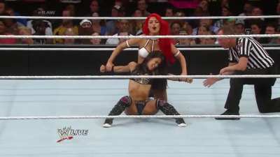 Eva Marie stretching AJ