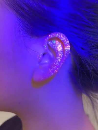 A very unusual tattoo that glows under ultraviolet light