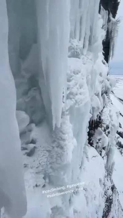 Hanging at this cliff, with the water flowing behind the ice