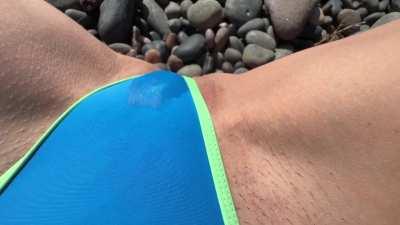 Wetting my swimsuit at the beach.