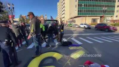 [Double Standards] Michigan State Police allow BLM protestors to lay in road blocking traffic but Trump supporters are forced to sidewalk.