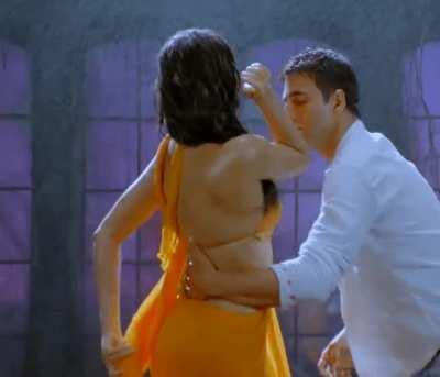 Katrina Kaif + sexy, orange saree + water + killer expressions = perfection