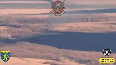 Destruction of a Russian Tor air defense system using an FPV Drone. Footage by the Ukrainian 103rd Brigade, via Serhii Sternenko. November 2023.