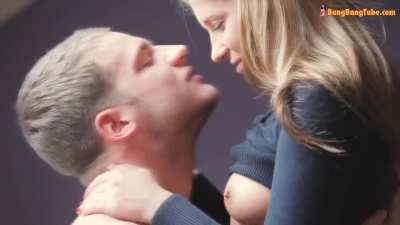 Young couple kissing and cuddling