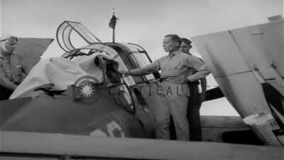 A US Navy Grumman TBF Avenger is struck by a 40mm flak shell. The rear gunner is completely destroyed from the round as the plane lands on the ship. The gunner is later given a sea burial in the plane he fought in. Manila Phillipines, November 5th, 1944.