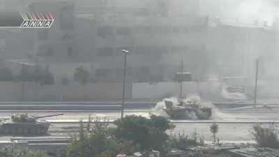 Syrian Armor takes casualties to rebel anti-tank teams during an operation to retake territory in Jobar - 8/21/2013