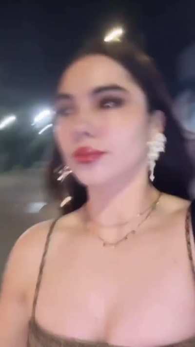 McKayla walking down the street, wearing dress | IG story 8/11/24