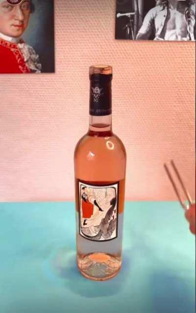 Uncorking a wine bottle using vibration.