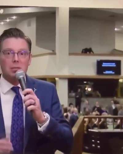 Guy being a dude in the background of a TV broadcast