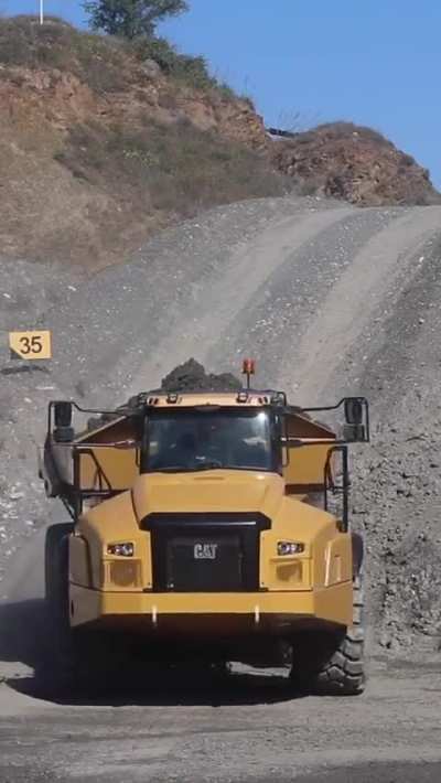 Operator Skill and Cat Engineering, Smooth Downhill ADT Control