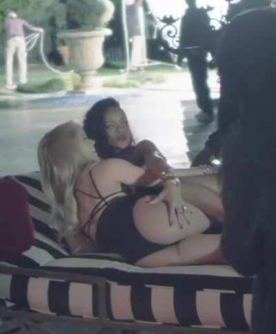 Rihanna grabbing a feel of Shakira