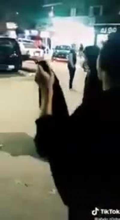 Cleaning a car that's moving with a really long shirt/dress?