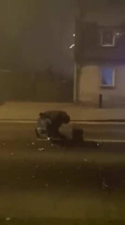 Using some low quality fireworks in the middle of a road at night. [NSFW]