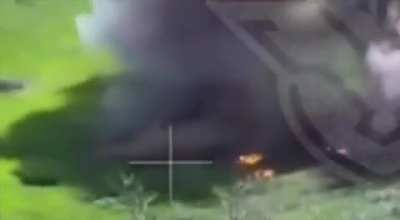 A Russian soldier attempts to cross a field on a motorcycle and runs over a landmine. (Music from source)