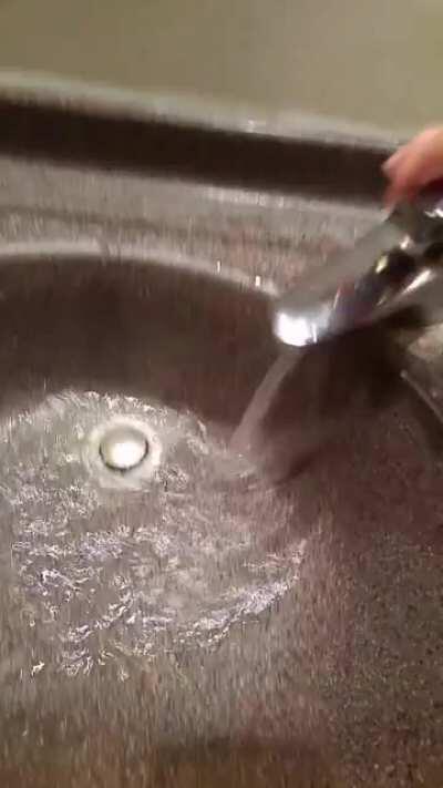 Almost attached to the sink